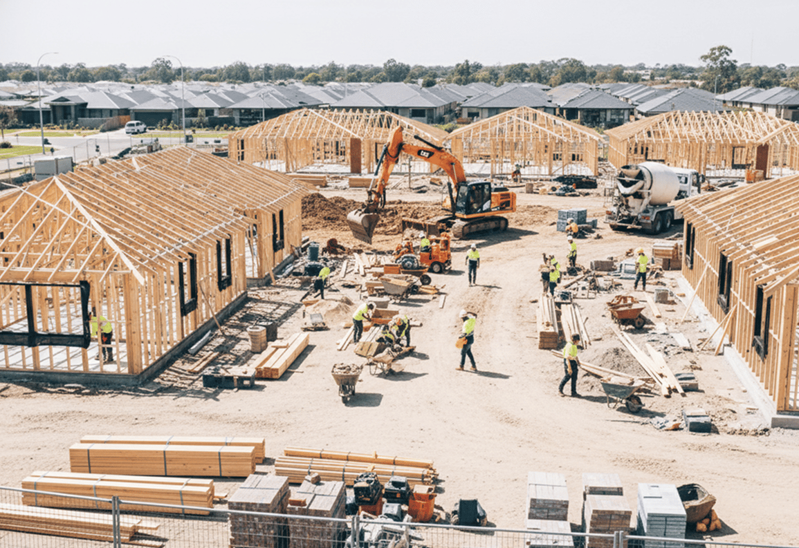 Modern workspace with an iMac displaying 'DO MORE'